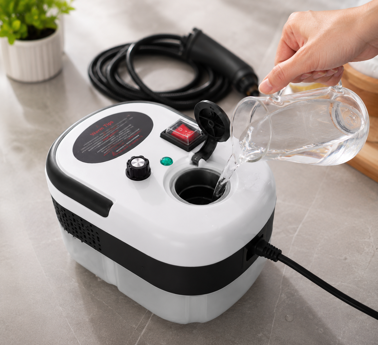Filling the portable steam cleaner water tank